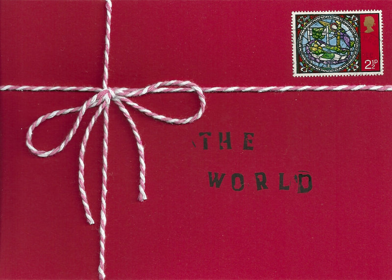 Scan of a red card tied in string, like a parcel.  There is a postage stamp in the top right corner and it is addressed to "The World".